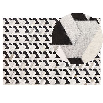 Area Rug Black And White Cowhide Leather 140 X 200 Cm Geometric Pattern Patchwork Beliani