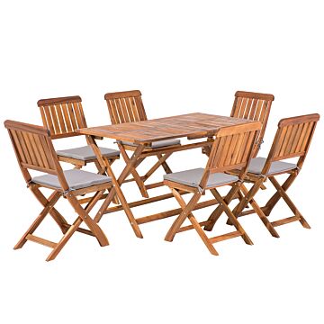 Garden Dining Set Acacia Wood Folding Chairs With Cushions 6 Seater 140 X 75 Cm Beliani