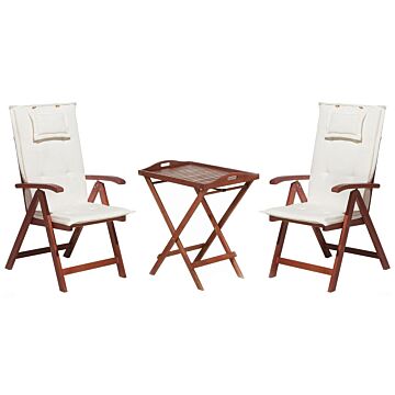 Garden Bistro Set Dark Acacia Wood With Off-white Cushions Tea Table 2 Folding Chairs Uv Resistant Beliani