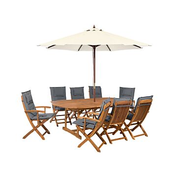 Outdoor Dining Set Light Acacia Wood With Grey Cushions 8 Seater Table Folding Chairs Beige Umbrella Beliani