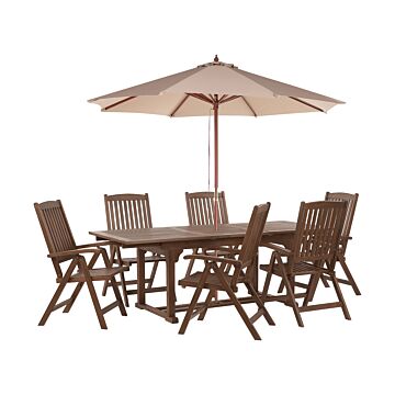 Garden Dining Set Dark Solid Acacia Wood Extending Table 6 Chairs With Parasol Adjustable Backrest Folding Rustic Style Beliani