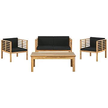 Garden Conversation Set Acacia Wood Black Cushions Modern Outdoor 4 Seater With Coffee Table Beliani