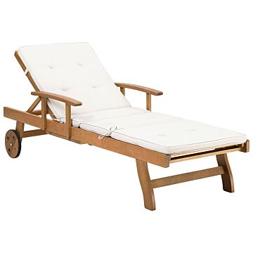 Garden Sun Lounger Light Acacia Wood With Off-white Cushion Outdoor Weather Resistant Reclining With Wheels Beliani