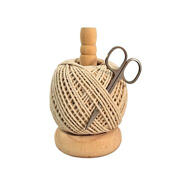 String Ball & Scissors On A Wooden Stand