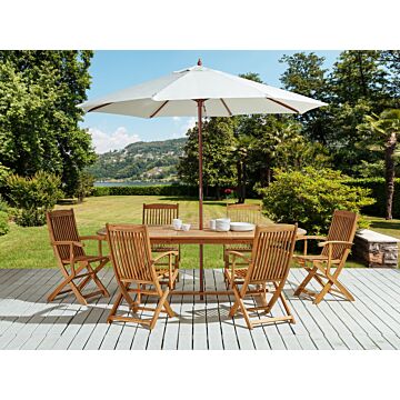 Outdoor Dining Set Light Acacia Wood 6 Seater Table Folding Chairs Rustic Design Parasol To Choose Beliani