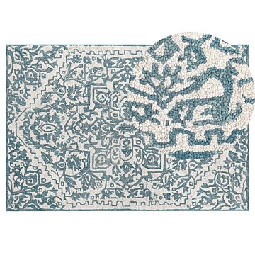 Area Rug White Blue Wool 140 X 200 Cm Flat Weave Hand Tufted Oriental Pattern Beliani