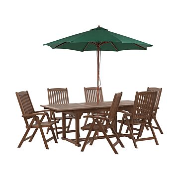 Garden Dining Set Dark Solid Acacia Wood Extending Table 6 Chairs With Parasol Adjustable Backrest Folding Rustic Style Beliani