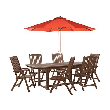 Garden Dining Set Dark Solid Acacia Wood Extending Table 6 Chairs With Parasol Adjustable Backrest Folding Rustic Style Beliani