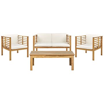 Garden Conversation Set Acacia Wood White Cushions Modern Outdoor 4 Seater With Coffee Table Beliani