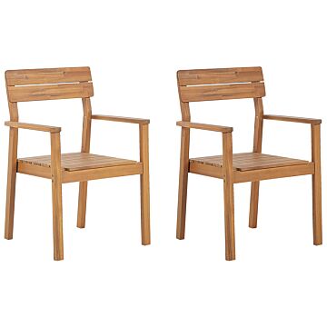 Set Of 2 Garden Chairs Light Acacia Wood Outdoor With Armrests Rustic Style Beliani
