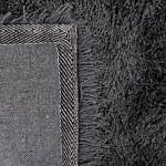 Shaggy Area Rug High-pile Carpet Solid Black Polyester Rectangular 140 X 200 Cm Beliani