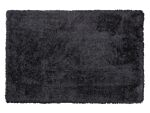 Shaggy Area Rug High-pile Carpet Solid Black Polyester Rectangular 140 X 200 Cm Beliani