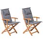 Set Of 2 Garden Dining Chairs Light Wood With Grey Cushion Acacia Wood Frame Folding Rustic Design Beliani