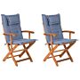 Set Of 2 Garden Dining Chairs Light Wood With Blue Cushion Acacia Wood Frame Folding Rustic Design Beliani