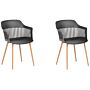 Set Of 2 Dining Chairs Black Synthetic Material Metal Legs Open Work Backrest Modern Living Room Beliani