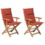 Set Of 2 Garden Dining Chairs Light Wood With Red Cushion Acacia Wood Frame Folding Rustic Design Beliani