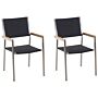 Set Of 2 Garden Dining Chairs Black And Silver Faux Rattan Seat Stainless Steel Legs Stackable Outdoor Resistances