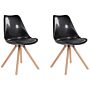 Set Of 2 Dining Chairs Black Faux Leather Seat Sleek Wooden Legs Armless