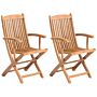 Set Of 2 Garden Dining Chairs Light Wood Acacia Wood Frame Folding Rustic Design Beliani