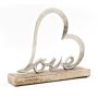 Metal Heart Of Love On A Wooden Base