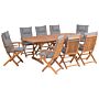 Outdoor Dining Set Light Acacia Wood With Grey Cushions 8 Seater Table Folding Chairs Rustic Design Beliani